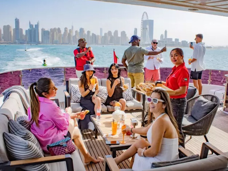 Friends Gathering | Discover the luxury and the magic of travel spots in Dubai Marina. Select the best yachts to go to and improve your experience from the available types of yachts.